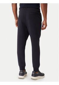 BOSS Spodnie dresowe Hadiko 50506141 Granatowy Regular Fit. Kolor: niebieski. Materiał: bawełna #4