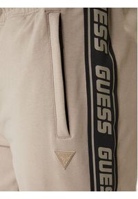 Guess Spodnie dresowe Z2YB19 K6ZS1 Beżowy Regular Fit. Kolor: beżowy. Materiał: bawełna #3