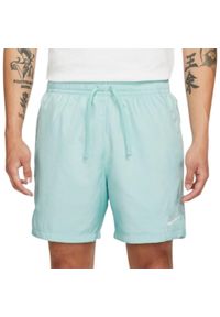 Spodenki sportowe męskie Nike NSW Spe Wvn Lnd Short Flow. Kolor: zielony