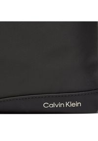 Calvin Klein Saszetka Rubberized Conv Flatpack K50K511254 Czarny. Kolor: czarny. Materiał: materiał #4