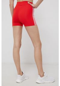 adidas Originals Szorty damskie kolor czerwony gładkie high waist. Stan: podwyższony. Kolor: czerwony. Materiał: materiał, dzianina. Wzór: gładki
