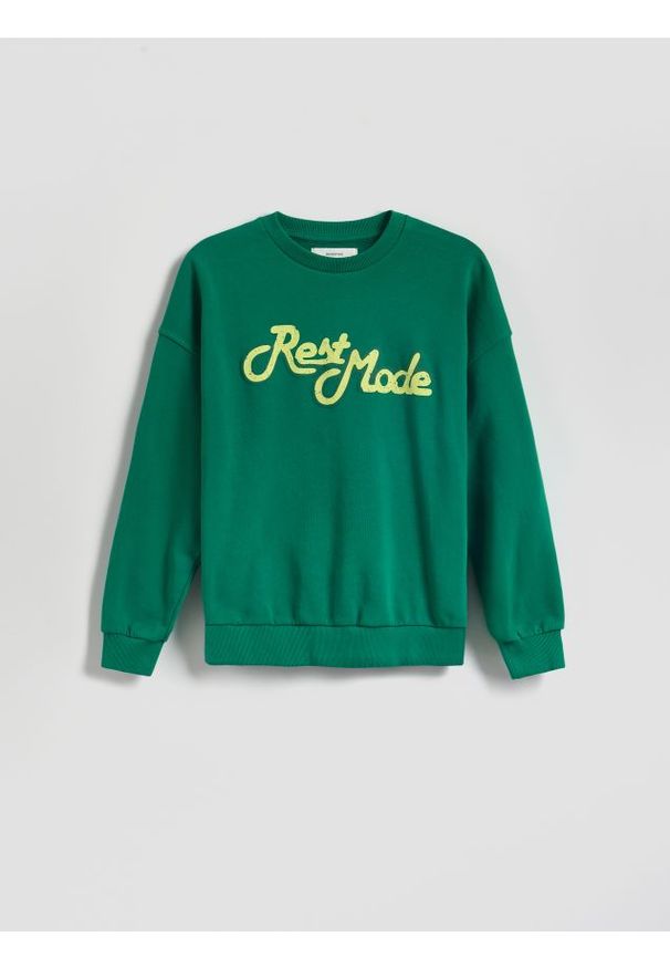 Reserved - Bluza oversize z nadrukiem - jasnozielony. Kolor: zielony. Materiał: dzianina, bawełna. Wzór: nadruk