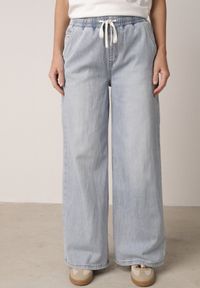 Born2be - Niebieskie Jeansy z Lyocellem i Bawełną o Szerokim Kroju z Wiązaniem Zolia. Okazja: na co dzień. Kolor: niebieski. Styl: casual #7