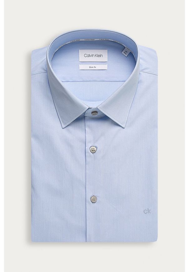 Calvin Klein - Koszula. Typ kołnierza: kołnierzyk klasyczny. Kolor: niebieski. Materiał: tkanina, bawełna, poliamid, elastan. Długość: długie. Wzór: gładki. Styl: elegancki, klasyczny