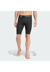 Adidas - Krótkie kompresyjne legginsy treningowe TECHFIT. Kolor: czarny. Materiał: materiał. Technologia: Techfit (Adidas). Długość: krótkie. Sport: fitness
