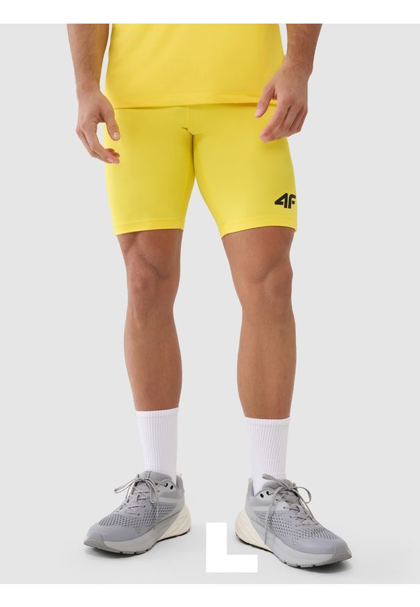4f - 4F Legginsy krótkie treningowe męskie - żółte XL. Kolor: żółty. Materiał: dzianina, elastan, włókno, syntetyk, materiał. Wzór: gładki, jednolity, ze splotem. Sport: fitness
