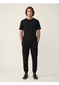 Sinsay - Spodnie jogger slim fit - czarny. Kolor: czarny