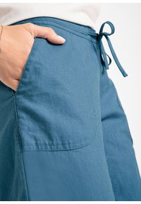 bonprix - Spodnie lniane z szerokimi nogawkami. Kolor: niebieski. Materiał: len #2