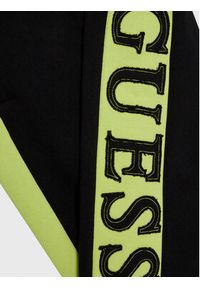Guess Spodnie dresowe L3RQ24 KA6R3 Czarny Regular Fit. Kolor: czarny. Materiał: bawełna
