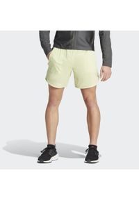 Adidas - Spodenki treningowe męskie adidas HIIT. Kolor: zielony, wielokolorowy, żółty. Materiał: materiał. Sport: fitness