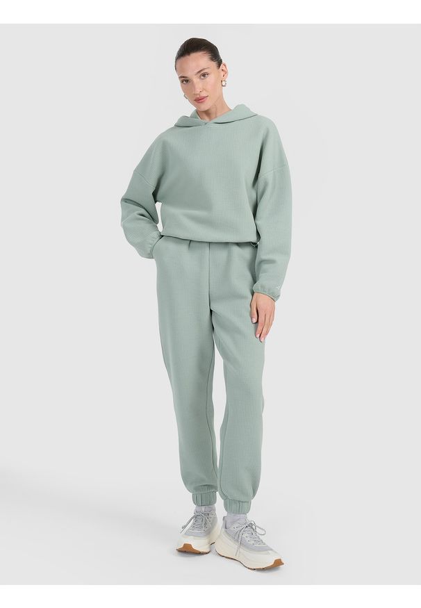 4f - 4F Spodnie dresowe z waflowej dzianiny damskie - turkusowe XS. Stan: podwyższony. Kolor: turkusowy. Materiał: dzianina, dresówka