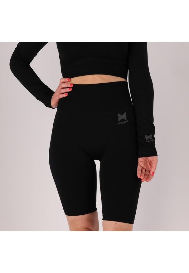 XTREME - Damski top sportowy Długie rękawy. Kolor: czarny. Materiał: elastan, poliester. Długość rękawa: długi rękaw. Długość: długie. Sport: fitness