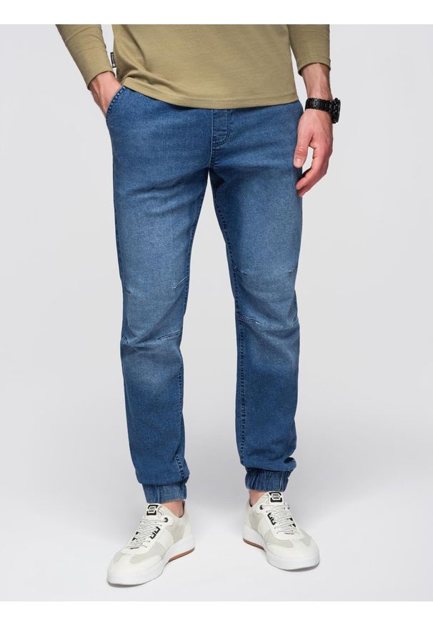 Ombre Clothing - Męskie spodnie JOGGERY jeansowe z efektem sprania - niebieskie V2. Okazja: na co dzień. Kolor: niebieski. Materiał: jeans. Wzór: aplikacja. Styl: casual, elegancki