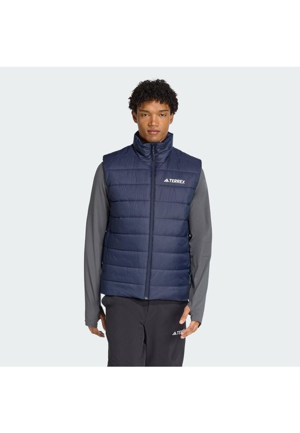 Adidas - Bezrękawnik Terrex Multi Essentials CLIMAWARM Padded. Kolor: niebieski. Długość rękawa: bez rękawów. Technologia: ClimaWarm (Adidas). Sport: turystyka piesza