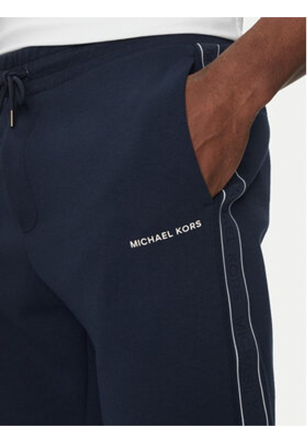 Michael Kors Spodnie dresowe CT4524J5MF Granatowy Regular Fit. Kolor: niebieski. Materiał: bawełna