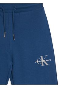 Calvin Klein Jeans Spodnie dresowe Monogram Logo IU0IU00285 D Niebieski Regular Fit. Kolor: niebieski. Materiał: bawełna #2