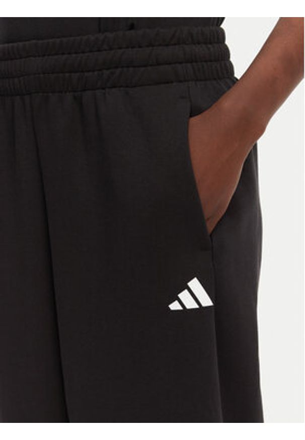 Adidas - adidas Spodnie dresowe Future Icons 3-Stripes Parachute JE0141 Czarny Loose Fit. Kolor: czarny. Materiał: bawełna