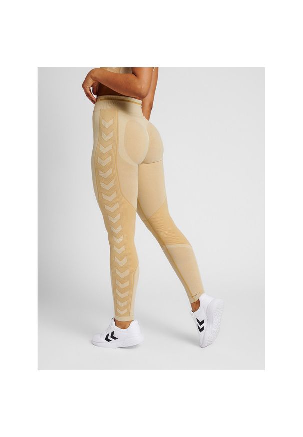 Legginsy damskie Hummel MT Lulu. Kolor: beżowy, wielokolorowy, brązowy. Materiał: dzianina. Sport: joga i pilates