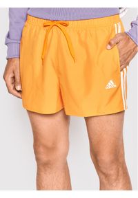 Adidas - adidas Szorty kąpielowe Classic 3-Stripes HA0401 Pomarańczowy Regular Fit. Kolor: pomarańczowy. Materiał: syntetyk