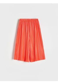 Reserved - Plisowane spodnie kuloty - koralowy. Kolor: pomarańczowy. Materiał: dzianina