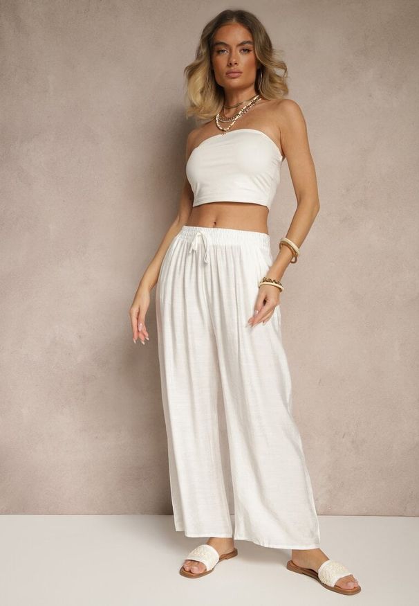 Renee - Jasnobeżowe Spodnie z Wiskozy High Waist o Szerokim Kroju Divlise. Okazja: na co dzień. Stan: podwyższony. Kolor: beżowy. Materiał: wiskoza. Styl: elegancki, casual