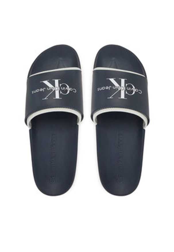 Calvin Klein Jeans Klapki Slide Rubber Neoprene Monologo YM0YM00361 Granatowy. Kolor: niebieski