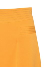 CATERINA - Pomarańczowe spodnie Wide leg. Stan: podwyższony. Kolor: pomarańczowy