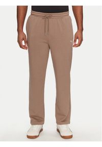 Puma Spodnie dresowe Ess 629651 Brązowy Relaxed Fit. Kolor: brązowy. Materiał: bawełna #1