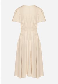 Born2be - Beżowa Sukienka Vices o Rozkloszowanym Kroju z Odpinanym Kwiatem 3D Rallarea. Kolor: beżowy. Wzór: kwiaty. Sezon: wiosna, lato #4