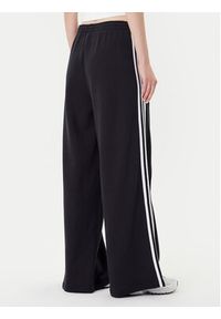 Adidas - adidas Spodnie dresowe adicolor 3-Stripes JV7473 Czarny Wide Leg. Kolor: czarny. Materiał: bawełna #3