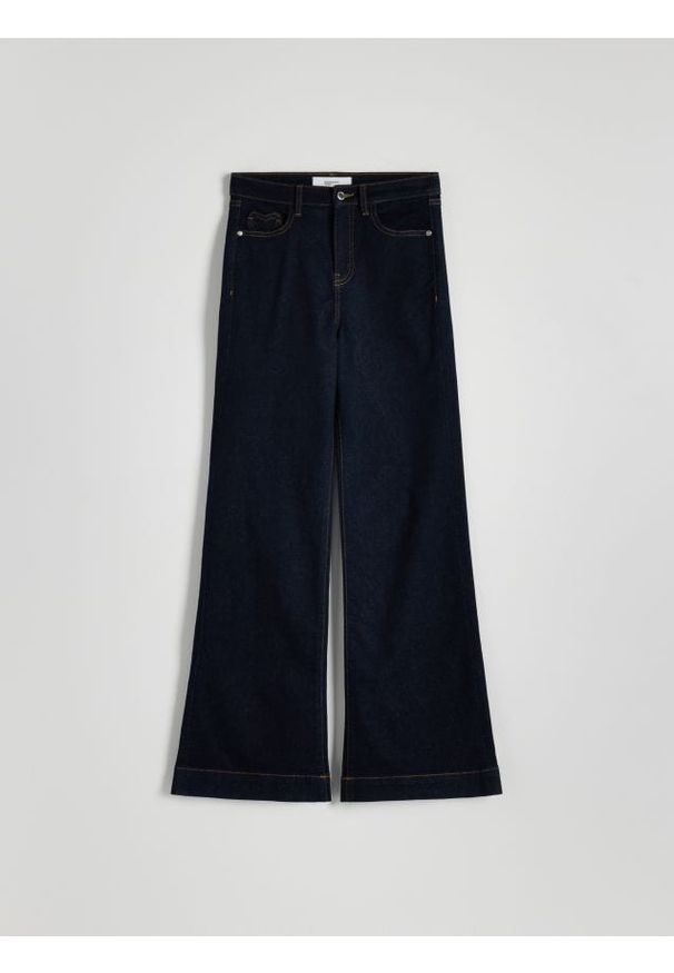 Reserved - Jeansy flare - granatowy. Kolor: niebieski. Materiał: jeans