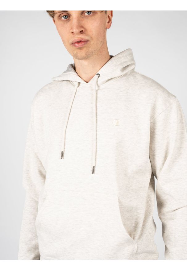 Champion Bluza "Hoodie" | HBS0889407D55 | Mężczyzna | Szary. Okazja: na co dzień. Typ kołnierza: kaptur. Kolor: szary. Materiał: bawełna, poliester. Wzór: aplikacja, nadruk. Styl: casual