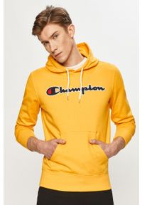 Champion - Bluza bawełniana. Okazja: na co dzień. Typ kołnierza: kaptur. Kolor: żółty. Materiał: bawełna. Wzór: aplikacja. Styl: casual #1