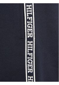 TOMMY HILFIGER - Tommy Hilfiger Spodnie dresowe Tape KB0KB08476 Granatowy Regular Fit. Kolor: niebieski. Materiał: bawełna