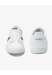 Lacoste - LACOSTE - Białe skórzane sneakersy z wyhaftowanym logo Europa. Okazja: na co dzień. Zapięcie: pasek. Kolor: biały. Materiał: skóra. Szerokość cholewki: normalna. Wzór: napisy, haft, aplikacja. Sport: tenis #2