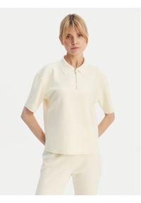 Calvin Klein Polo LV044E241G Beżowy Relaxed Fit. Typ kołnierza: polo. Kolor: beżowy. Materiał: syntetyk #1