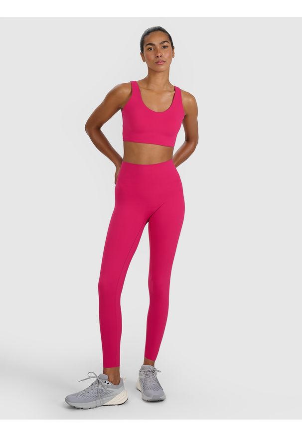 4f - 4F Biustonosz treningowy ze średnim wsparciem - różowy XS. Kolor: różowy. Materiał: elastan, włókno, syntetyk, materiał, guma. Wzór: gładki, ze splotem. Sport: fitness, bieganie, kolarstwo