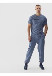 4f - 4F Spodnie dresowe joggery męskie - niebieskie XXL. Kolor: niebieski. Materiał: dresówka. Wzór: gładki, ze splotem