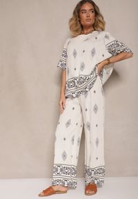 Renee - Beżowo-Szary Komplet w Stylu Boho Bluzka z Krótkim Rękawem i Luźne Spodnie Divorine. Kolor: beżowy. Materiał: materiał