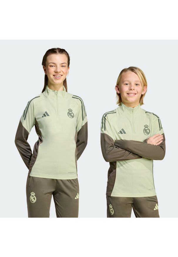 Adidas - Bluza Real Madryt Tiro 25 Competition Kids. Kolor: zielony. Materiał: dresówka. Sport: piłka nożna