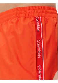 Calvin Klein Swimwear Szorty kąpielowe KM0KM00956 Pomarańczowy Regular Fit. Kolor: pomarańczowy. Materiał: syntetyk