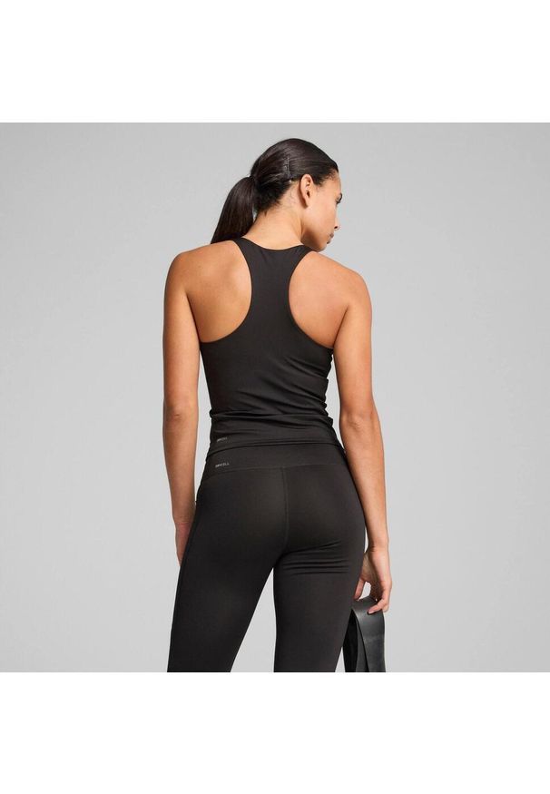 Puma - Damska koszulka bez rękawów TAD ESSENTIALS 2-in-1 PUMA. Kolor: czarny, wielokolorowy, biały. Długość rękawa: bez rękawów. Sport: bieganie