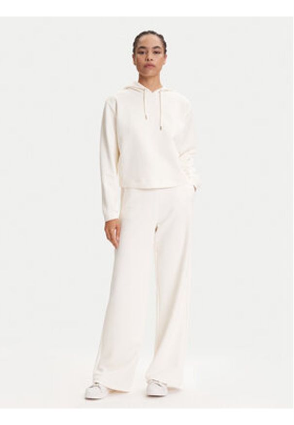 Guess Spodnie dresowe V5YB19 KBSL2 Écru Regular Fit. Materiał: syntetyk