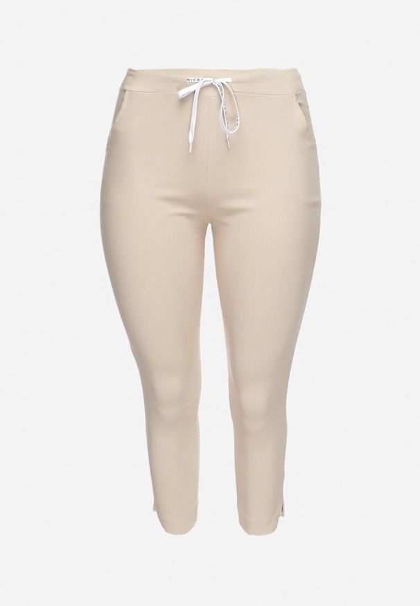 Born2be - Jasnobeżowe Spodnie High Waist z Troczkiem w Pasie Istmena. Okazja: na co dzień, na spotkanie biznesowe. Stan: podwyższony. Kolor: beżowy. Styl: biznesowy, elegancki, casual