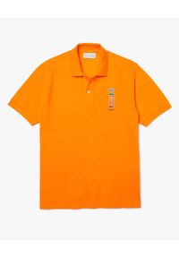Lacoste - LACOSTE - Pomarańczowa koszulka polo z logo Regular Fit. Typ kołnierza: polo. Kolor: pomarańczowy. Materiał: bawełna. Wzór: haft, prążki, aplikacja. Sezon: wiosna #1