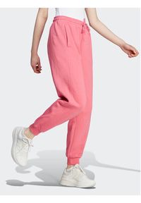 Adidas - adidas Spodnie dresowe ALL SZN Fleece IM0334 Różowy Loose Fit. Kolor: różowy. Materiał: bawełna #3