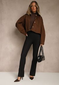 Renee - Czarne Prążkowane Spodnie o Kroju Flare z Gumką w Pasie Zoiane. Okazja: na co dzień. Stan: podwyższony. Kolor: czarny. Materiał: prążkowany. Styl: casual