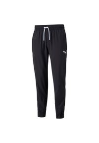 Spodnie Dresowe Sportowe Męskie Puma Train Vent Woven. Kolor: czarny. Materiał: dresówka. Sport: piłka nożna #1