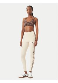Adidas - adidas Legginsy Seasonal Essentials Animal Print 3-Stripes KR7619 Beżowy jasny Slim Fit. Kolor: beżowy. Materiał: bawełna. Wzór: nadruk #2