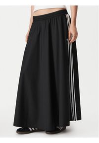 Adidas - adidas Spodnie dresowe Firebird Skirt KR6663 Czarny Relaxed Fit. Kolor: czarny. Materiał: syntetyk #1